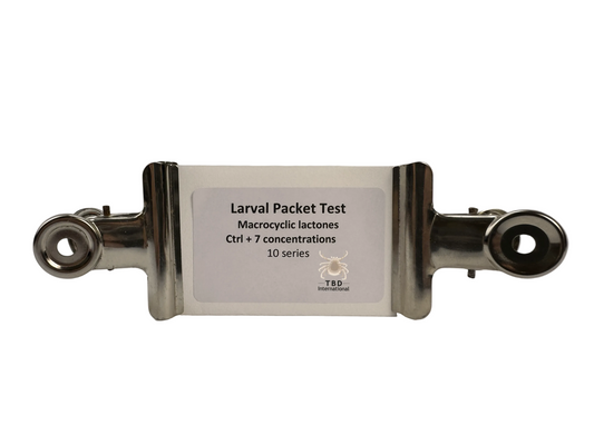 Larval Packet Test with two metal buldog clips to be used for macrocyclic lactones; label on a white background