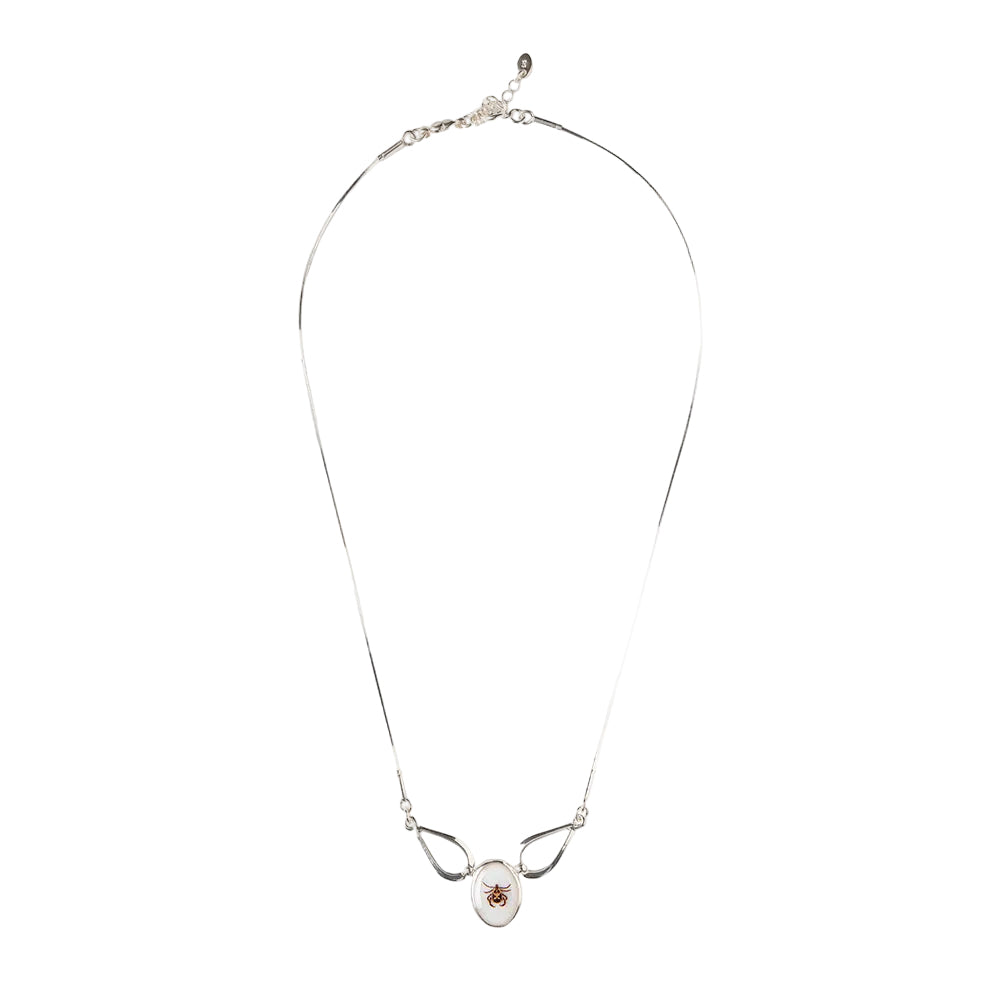 Silver necklace with a pendant on a white background